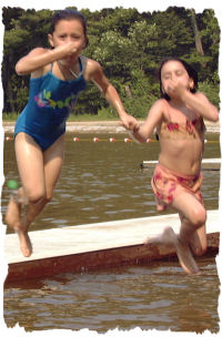 Two Girls Jumping in Water photo courtesy of Jack Porcello